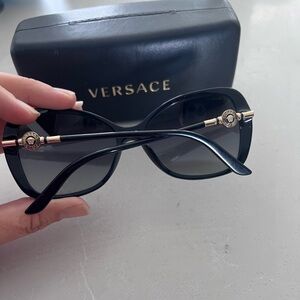 Gold and black Versace sunglasses